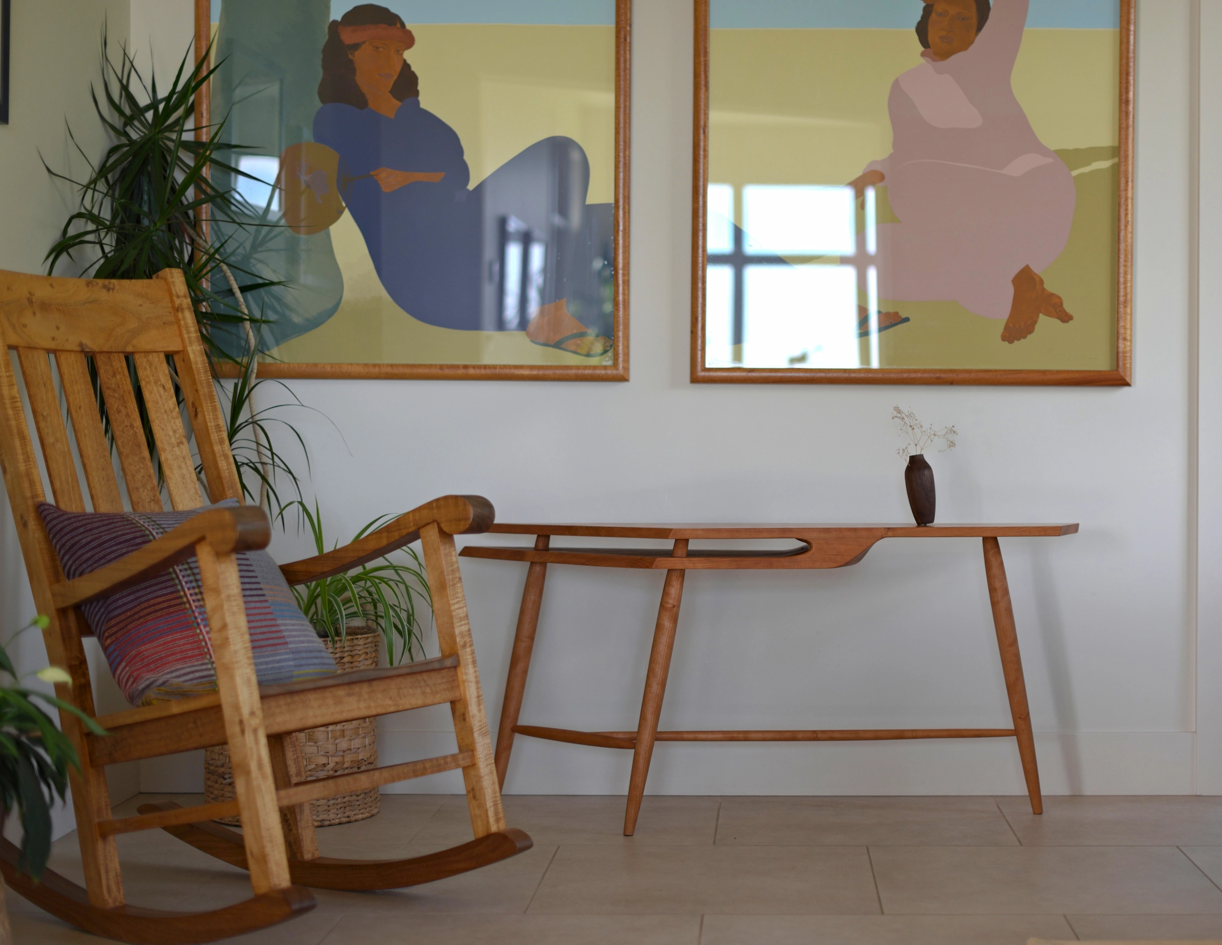 A Studio Fritz Cove Side Table beside a rocking chair in a client home